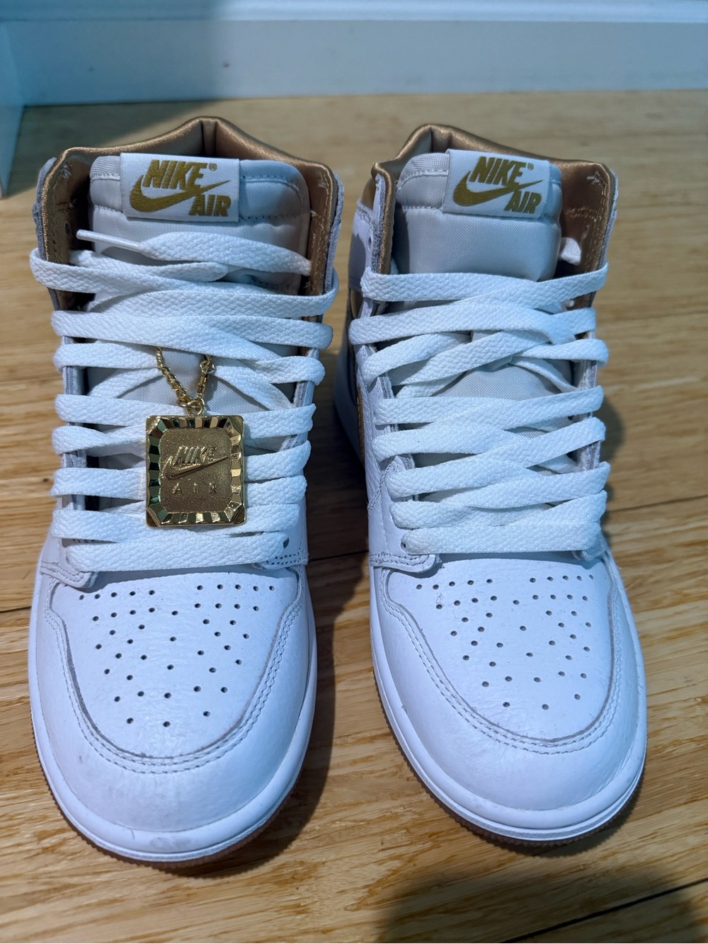Nike White & Gold High-Top Sneakers with Gold Hang Tag